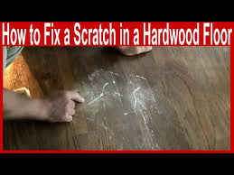 fix a scratch in a hardwood floor
