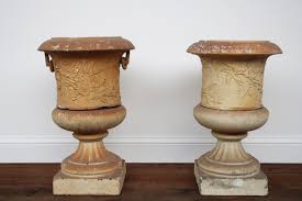 victorian clay garden urns on pedestals