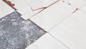 tiles or glue may contain asbestos