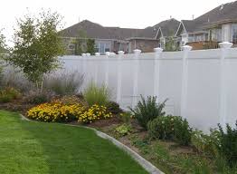 Combining metal posts and frames with wood pickets for the interior of the fence gives your backyard fence a modern look. Backyard Fencing Ideas Landscaping Network