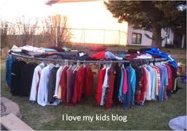 Diy clothes rack for yard sale sale clothes clothes racks clothes storage garage sale tips diy garage garage ideas laminate installation tile care. How To Hang Clothes At A Yard Sale Use A Trampoline Jpg I Love My Kids Blog
