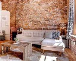 exposed brick wall living room design