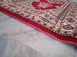 red wool mosque carpet roll