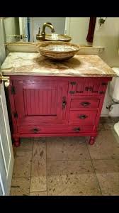The wooden vanity countertop runs straight on as bathtub panelling and continues all the way up the wall. The Trunk Trader Facebook Special Ordered Rustic Barn Red Antiqued Bathroom Vanity Cabinet With Vessel Si Bathroom Red Wooden Bathroom Vanity Bathroom Vanity