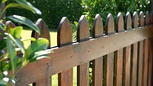 how to clean a wooden fence even