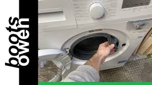 reseat a washing machine door seal