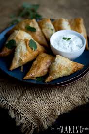 Spinach, feta, ricotta, and fresh herbs are encased in layers of flaky, buttery phyllo to finally, cut the dough into squares, piercing the top layer of dough completely without cutting too 1/2 teaspoon kosher salt. Spanakopita Triangles Spinach And Feta Phyllo Appetizer Let The Baking Begin