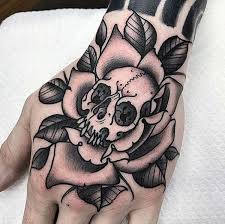 skull hand tattoo designs with meaning
