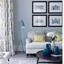 grey living room with yellow highlights