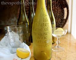 Wine Bottle Into An Etched Water Carafe