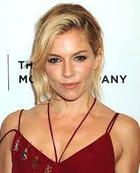 sienna miller promotes high rise in red