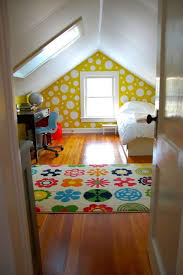 They are the best place for kids room but also for bedroom. Attic Kids Bedroom Yellow Polka Dot Wall Attic Bedroom Small Attic Bedroom Designs Attic Rooms