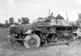 The charred remnants of a German SdKfz 251 | World War Photos