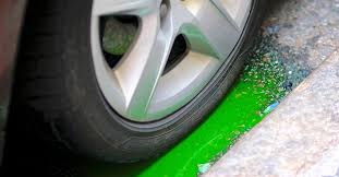why is green fluid leaking from a car