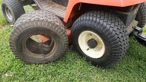 replacing a tire on a lawn tractor or