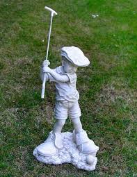 boy playing golf garden statue bring a
