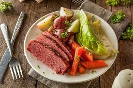 Place the corned beef, fat side up in your pressure cooker and the onions along the sides. Perfect Corned Beef Recipe With Guinness And Cabbage