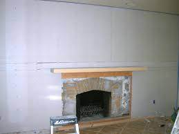 Flush with the wall, the fireplace has a raised hearth that projects into the room. How To Build A Standard Wall Over A Stone Wall How Tos Diy