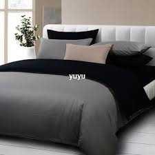 white bedding grey and white comforter