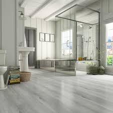 In this kitchen, the floor is comprised of sheet vinyl printed with images of hardwood planks. Luxury Vinyl Flooring And Other Vinyl Options For Your Bathroom Builddirect Blog