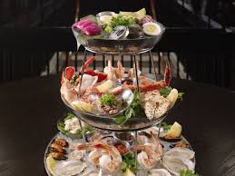This meal can take place any time from the evening of christmas eve to the evening of christmas day itself. Best Seafood Towers In Boston Eater Boston