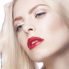 face woman model red lips makeup with