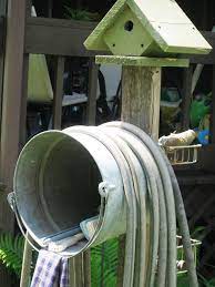 Garden Hose Holders And Hose Reels