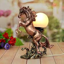 horse with l show piece candles