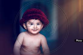 image of indian baby boy with smiling