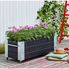 large outdoor planter on wheels