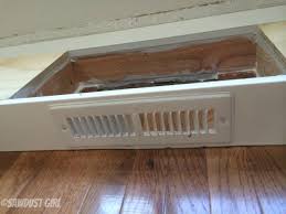 a cabinet base with a floor vent