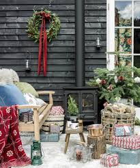 Decorate in a single color for turning a small, sculptural bare tree or shrub into something magical. Outdoor Christmas Decorating Ideas Ideal Home