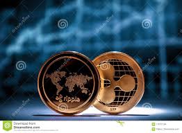 Two Golden Xrp Ripple Coins With Financial Charts On