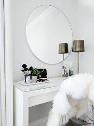 Round Mirror Over Makeup Vanity Design