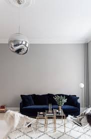 living rooms with blue velvet sofas