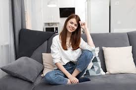 A Comfortable Woman Relaxing On A Sofa