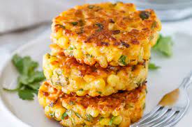 cheesy corn fritters recipe eatwell101