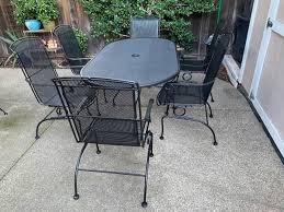 Wrought Iron Patio Table And 6 Rocking