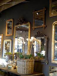 Dark Paint With Wall Of Gold Mirrors