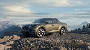 The santa cruz is essentially a tucson that had a truck bed swapped in for the rear cargo area. 2022 Santa Cruz Debut Sport Adventure Vehicle Hyundai Usa