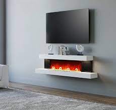 electric fireplace under a tv