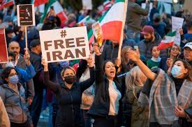 Iranians protest for tenth night, defying judiciary warning