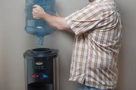 change a 5 gallon water cooler bottle