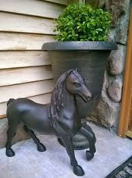 Toy Horse Turned Garden Sculpture