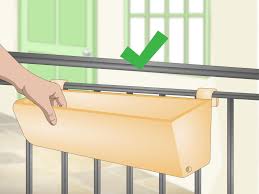 Black resin deck rail planter simplicity at its finest: 3 Ways To Hang Window Boxes Wikihow