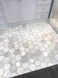 Measure flooruse a tape measure to determine how much tile, mortar, grout and backingboard will be needed. Love This Grey With The Darker Grout Hexagon Floor Tile In Bathroom Hexagon Bathroom Bathroom Tile Inspiration Small Bathroom Tiles Beautiful Tile Bathroom