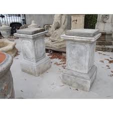 pair of cast stone garden pedestals
