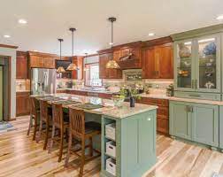 Decorating with sage green is a thing for 2018 according to pinterest by cynthia bowman on april 17 sage green kitchen features sage green cabinets paired with white quartz countertops and a white subway tiled backsplash. 26 Green Kitchen Cabinet Ideas Sebring Design Build Kitchen Remodeling