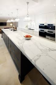 Choosing white cabinets once you've found a black countertop to suit your tuxedo kitchen, it's time to find the perfect white cabinets. 35 Quartz Kitchen Countertops Ideas With Pros And Cons Digsdigs