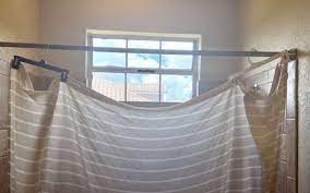 hang a shower curtain with tension rod